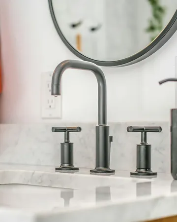 Covered: the finished wall with the new vanity and faucet